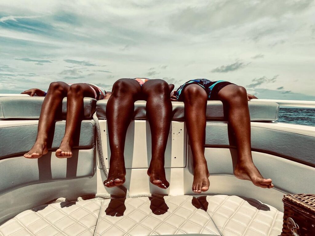 Legs in a boat shot on iphone by marina k