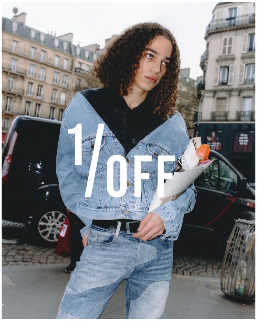 A model in head-to-toe 1/off paris' denim, stricking a pose