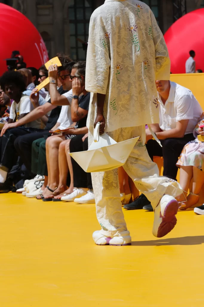 Detail from the Luois Vuitton runaway, focusing on the paper boat shaped bag